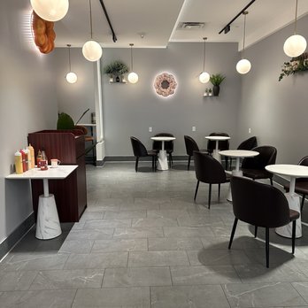 Mochinut - a restaurant with tables and chairs - Donuts Near Me - Bloomington, Minnesota