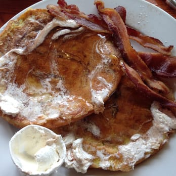Hole In One - Cinnamon roll french toast with a side of bacon! Yes, I slathered it in butter and syrup! - Bakeries Near Me - Orleans, Massachusetts Hole In One - Cinnamon roll french toast with a side of bacon! Yes, I slathered it in butter and syrup! - Bakeries Near Me - Orleans, Massachusetts