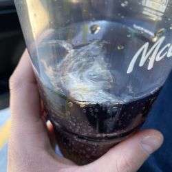 McDonald's - Saw this floating in my drink after the ice melted. Maybe from the plastic bag the cups come in. Yuckkkkk