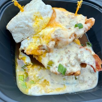 Dirty Bird - Dirty Bird sandwich--biscuit, fried chicken, bacon, fried egg, cheese, and gravy - American Near Me - Morgantown, West Virginia