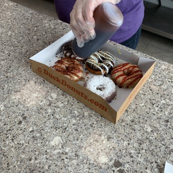 Duck Donuts - adding blackberry syrup per our request - Donuts Near Me - Asheville, North Carolina Duck Donuts - adding blackberry syrup per our request - Donuts Near Me - Asheville, North Carolina