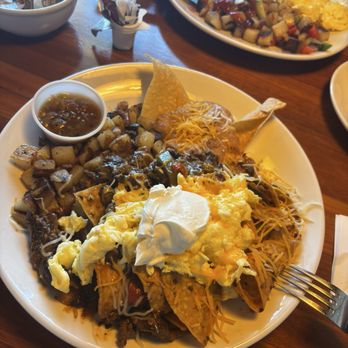 Early Birds Cafe - Chilaquiles with spice requested extra they sure delivered - Breakfast & Brunch Near Me - Fresno, California Early Birds Cafe - Chilaquiles with spice requested extra they sure delivered - Breakfast & Brunch Near Me - Fresno, California