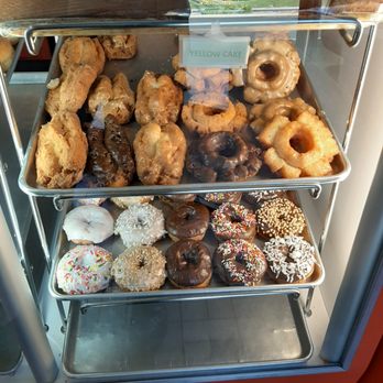 Manna Donuts - a variety of donuts in a display case - Donuts Near Me - Fountain Valley, California Manna Donuts - a variety of donuts in a display case - Donuts Near Me - Fountain Valley, California