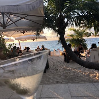 Tillies - View from our table through to the beach. The martini is tipsy. Me? Not yet... - Breakfast & Brunch Near Me - George Town, Florida