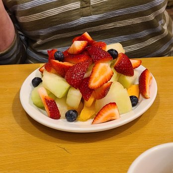 Sunny Morning - a plate of fruit on a table - Breakfast & Brunch Near Me - Toronto, Ontario Sunny Morning - a plate of fruit on a table - Breakfast & Brunch Near Me - Toronto, Ontario