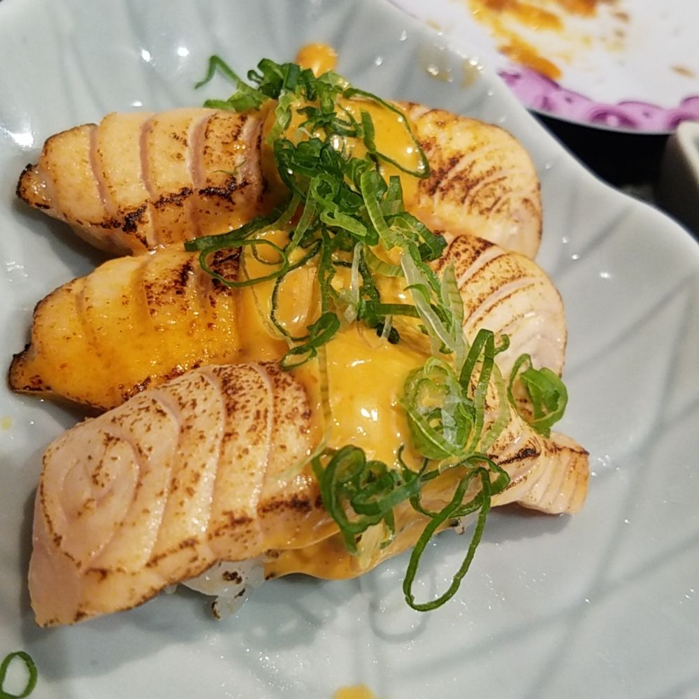 Sushi Zone - Seared salmon was delicious. Only 3.50 for 2 pieces. - Conveyor Belt Sushi Near Me - Bothell, Washington