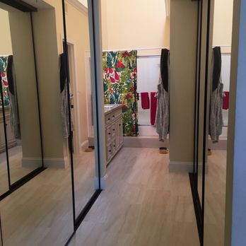 Turn Key Remodel - Flowing tile installed by Turnkey Remodel along with mirrored closet doors for Lindsey K. - General Contractors Near Me - Yorba Linda, California
