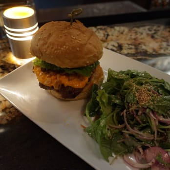 Jack Rose Dining Saloon - Friend made the mistake of ordering her burger medium-well, but it was still very good despite her poor judgment. Salad was overdressed. - American Near Me - Washington, DC, District of Columbia