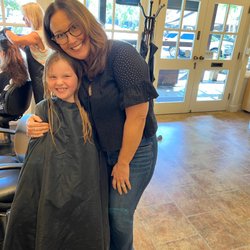 West Side Salon - Dena, the owner, with my daughter. We all love Dena!