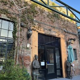 Exterior outside entrance of Mills Alley - Looking indoors from the lovely outdoor patio - Pasadena, California Exterior outside entrance of Mills Alley - Looking indoors from the lovely outdoor patio - Pasadena, California