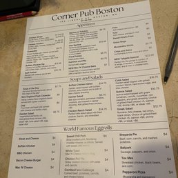 Menu - The menu from The Corner Pub Boston lists appetizers, soups, salads, and eggrolls, with prices and descriptions for each item.