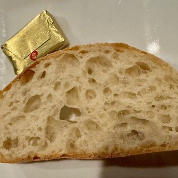 DeLuca's Italian Kitchen & Bar - Fresh Italian bread and butter - Italian Near Me - Boynton Beach, Florida DeLuca's Italian Kitchen & Bar - Fresh Italian bread and butter - Italian Near Me - Boynton Beach, Florida