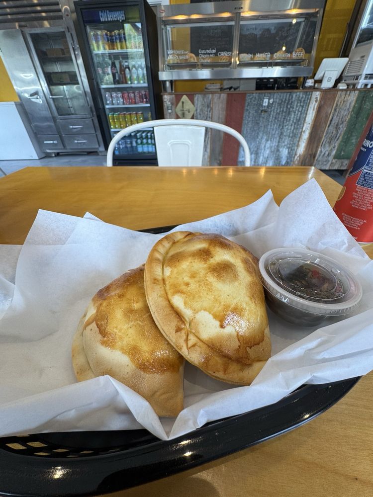 The Whole Empanada Logo
