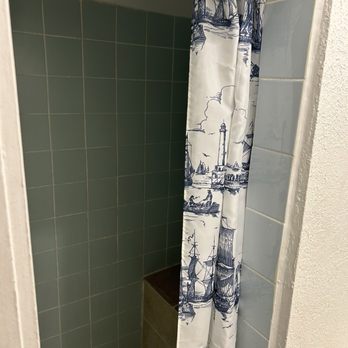 Americana Motel - Interior: shower stall - Hotels Near Me - Tucumcari, New Mexico Americana Motel - Interior: shower stall - Hotels Near Me - Tucumcari, New Mexico