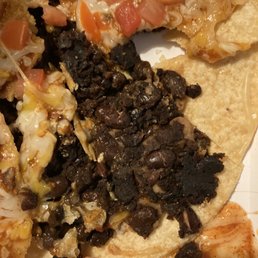Veg Mexican Pizza w/black beans tasted stale, black beans extremely burnt, was gross. Veg Mexican Pizza w/black beans tasted stale, black beans extremely burnt, was gross.