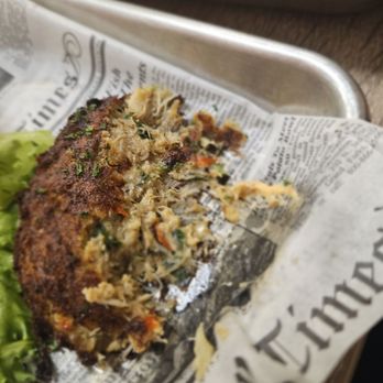 Melbourne Seafood Station - Half eaten crab cake - Seafood Near Me - Melbourne, Florida Melbourne Seafood Station - Half eaten crab cake - Seafood Near Me - Melbourne, Florida