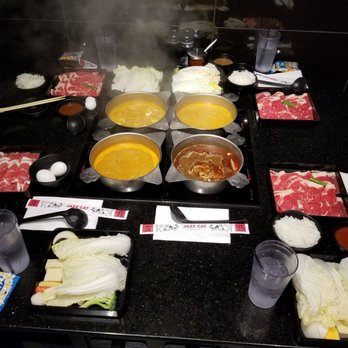 Jazz Cat Restaurant - Four individual pots can fit on one table - Asian Fusion Near Me - Arcadia, California