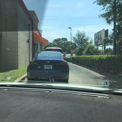 Dunkin' - Been stuck in the line for ages... I have no idea what the hold up is...