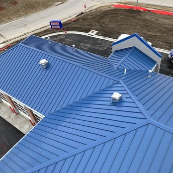 Pyramid Roofing - Metal roof replacement for Kansas City commercial building by Pyramid Roofing - durable and energy-efficient - Roofing Near Me - Grandview, Missouri