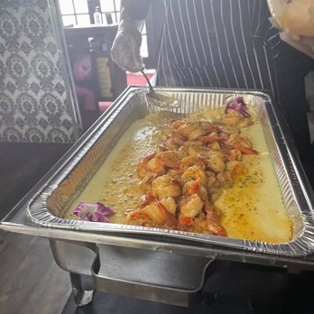 Chocolate Lounge ExClusive - a man holding a tray of food - Adult Entertainment Near Me - Dallas, Texas Chocolate Lounge ExClusive - a man holding a tray of food - Adult Entertainment Near Me - Dallas, Texas