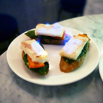 Ladybird - Saganaki - Flaming Soy Mozzarella, Smoked Carrot, Wild Arugula Pesto Looks fancy. But tastes devilish. - Vegan Near Me - New York, New York Ladybird - Saganaki - Flaming Soy Mozzarella, Smoked Carrot, Wild Arugula Pesto Looks fancy. But tastes devilish. - Vegan Near Me - New York, New York