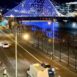 Samuel Beckett Bridge - Samuel Beckett Bridge night illumination from Customs House Quay.
