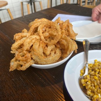 Noble Smoke - Ginormous plate of tasty onion rings. - Barbeque Near Me - Charlotte, North Carolina