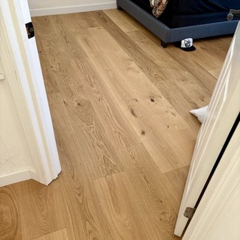 Lam's Flooring - Nasty carpet removed in bedroom, beautiful 4mm engineered wood installed. - Flooring Near Me