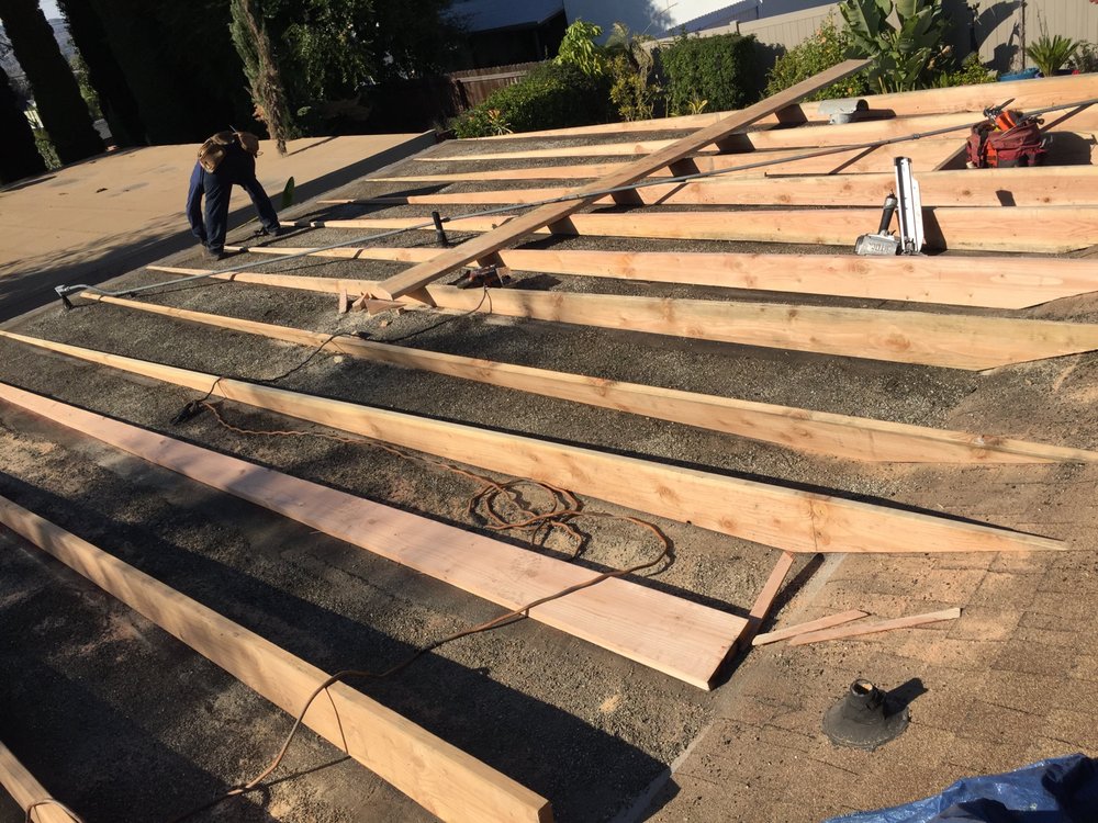 Slide of Al's roofing repairs