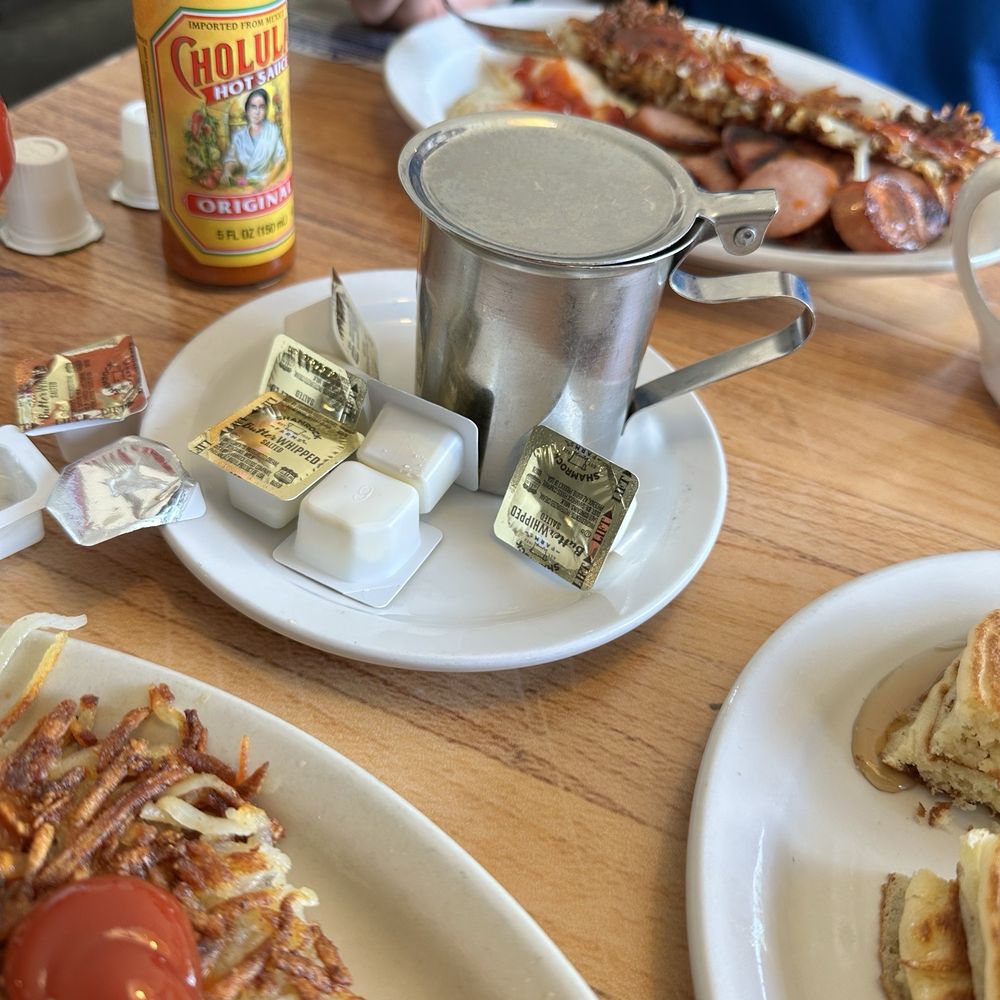 Nancy's Cafe - Warm syrup in stainless steel - Breakfast & Brunch Near Me - Westminster, Colorado Nancy's Cafe - Warm syrup in stainless steel - Breakfast & Brunch Near Me - Westminster, Colorado