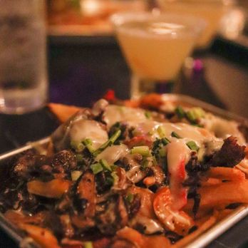 Andersons Eatery and Distillery - a tray of nachos - Whiskey Bars Near Me - Denton, Texas