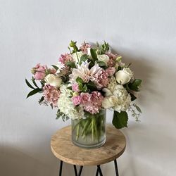 Encinitas Flower Shop - Designers choice arrangement - hydrangeas, lisianthus, roses, dahlia & stock in a low compact style