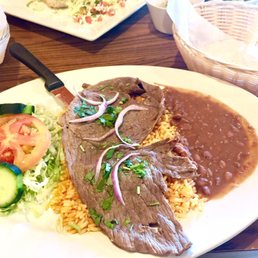 My bistec asado, with a steak threatening to droop off my plate. Loads of food!