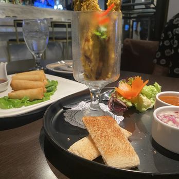 Noi Thai Cuisine - Satay chicken and crispy spring rolls - Thai Near Me - Honolulu, Hawaii