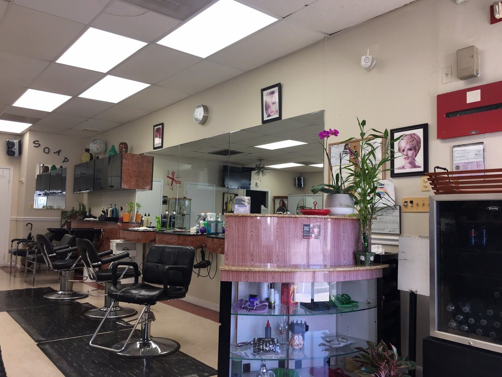 Izalco Hair Fashions Logo