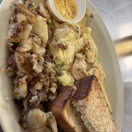 Seafood omelet with hash browns and Texas toast