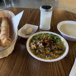 Fried breadstick, tea egg, savory tofu pudding, soymilk Fried breadstick, tea egg, savory tofu pudding, soymilk