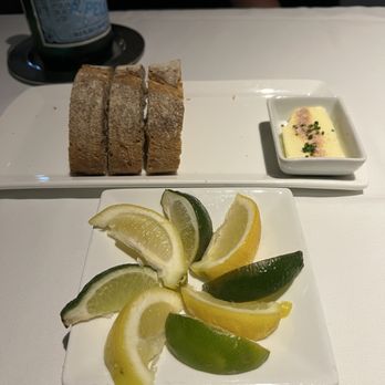 Eddie V's Prime Seafood - Bread and lemon/limes for the water - Seafood Near Me - Burlington, Massachusetts