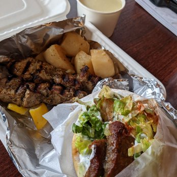Mykonos Greek Grill - Classic gyro wrap and pork souvlaki with lemon orzo soup and Greek potatoes - Greek Near Me - Seattle, Washington Mykonos Greek Grill - Classic gyro wrap and pork souvlaki with lemon orzo soup and Greek potatoes - Greek Near Me - Seattle, Washington