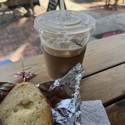 The Bean 226 - Emerald Isle Latte and tomato hummus sandwich.