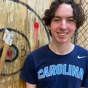 Patriot Brew Thru and Axe Throwing - a young man with a baseball bat - Axe Throwing Near Me - Hickory, North Carolina Patriot Brew Thru and Axe Throwing - a young man with a baseball bat - Axe Throwing Near Me - Hickory, North Carolina