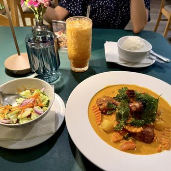 Enjoy Thai Cafe - Crispy Half Duck Curry with a side of Cucumber Salad.  This place is always delicious and high quality. Quality food at quality prices. - Thai Near Me - Henderson, Nevada