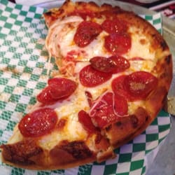 Coach's Corner - Pizza is pretty okay but not the best like Daily Herald says. I'm revoking their Chicago card.