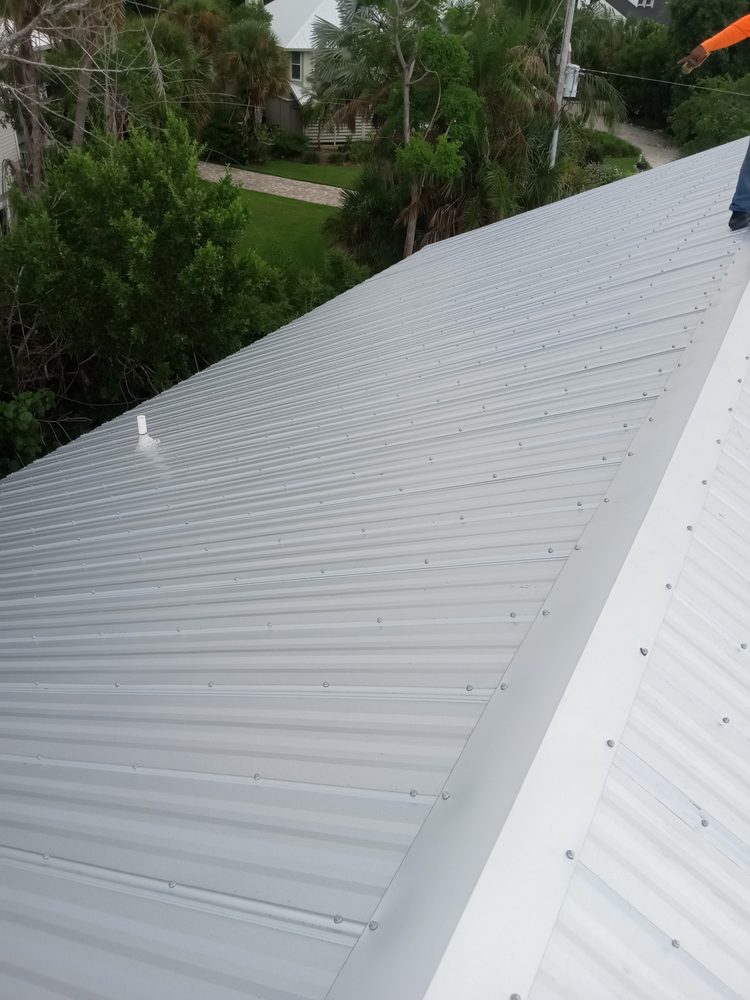 Slide of JG Helms Roofing