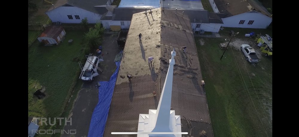 Slide of Truth Roofing