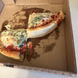 Deep dish pizza not fully cooked. Deep dish pizza not fully cooked.