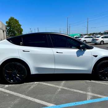 Genesis Window Tinting - Tesla Model Y Performance. Matte PPF, pillar delete, smoked headlights / taillights. Ceramic window tint. - Home Window Tinting Near Me - Elk Grove, California