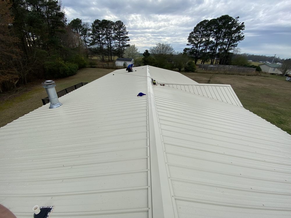 Slide of American Top Gun Roofing