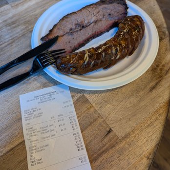 Tejas Chocolate Craftory - $25 for this one slice of brisket and one link of chorizo and cheese sausage... And a drink. - Chocolatiers & Shops Near Me - Tomball, Texas