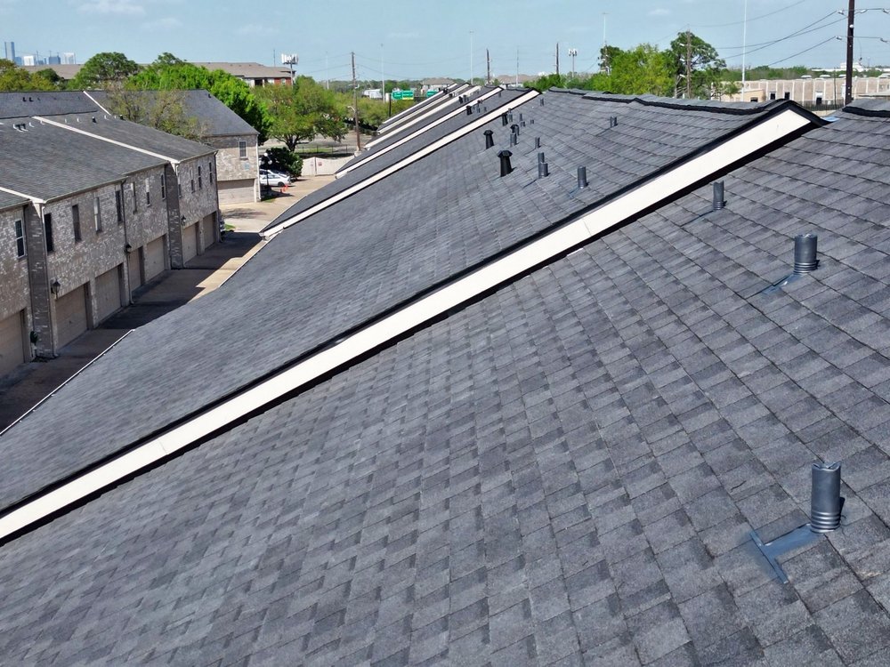 Slide of Whatley Roofing